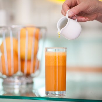 Ein Glas mit Mentorix - Saft gefüllt